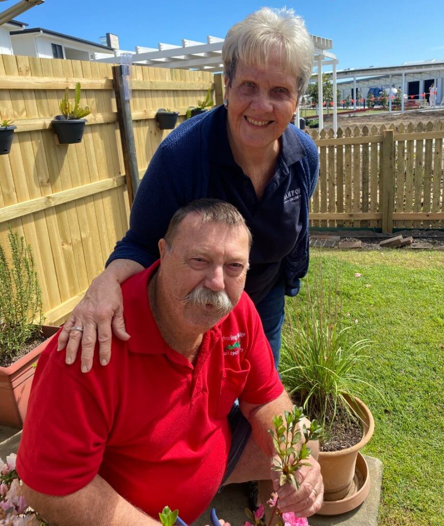 Residents Allan and Vicki Svensen tending to azaleas