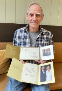 Laurie with dedicated cards he received for his anniversary.